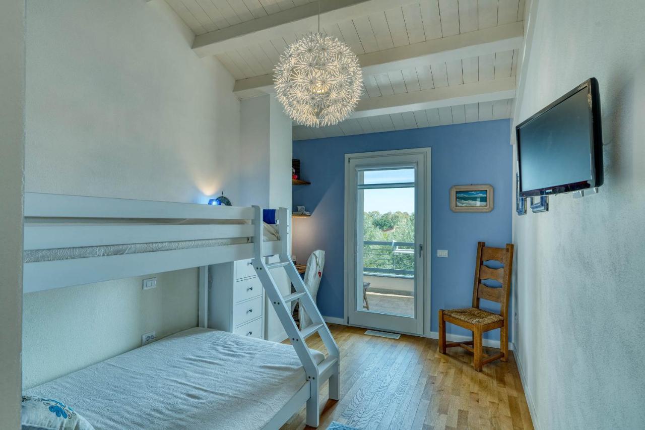 La Casa Degli Ulivi Appartamento In Villa Con Patio Quartu SantʼElena Exterior foto